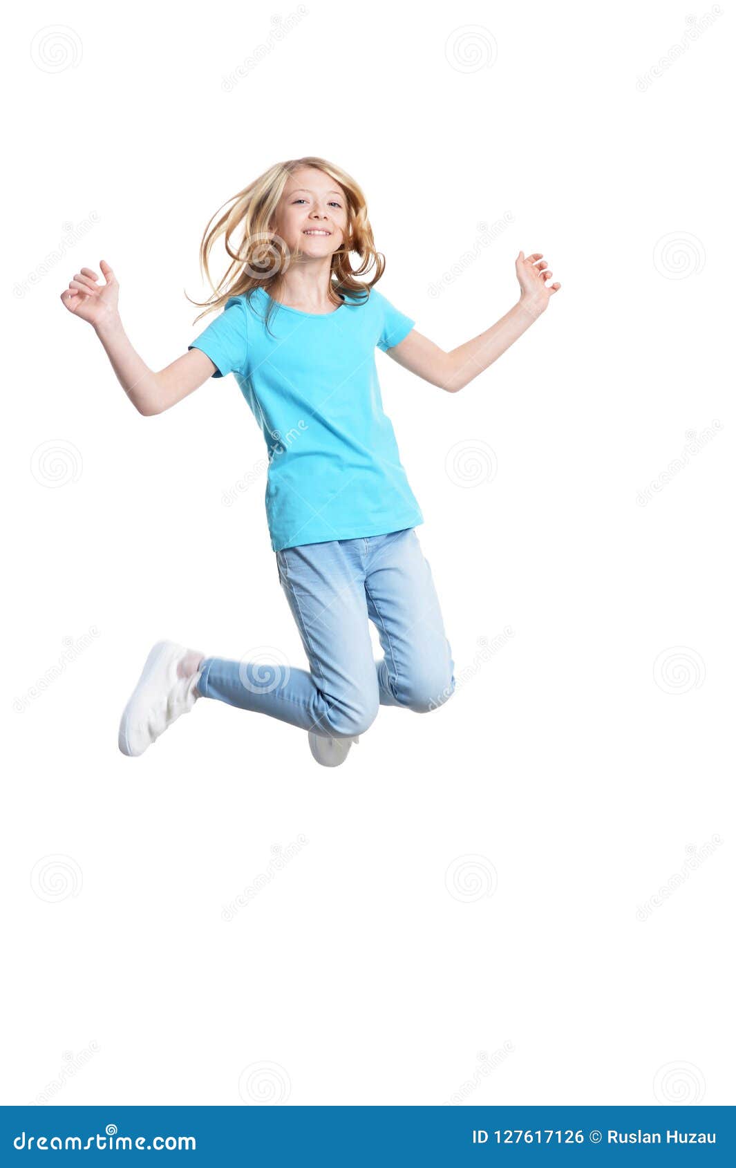 Cute Girl In Casual Clothing Jumping On White Background Stock Photo ...