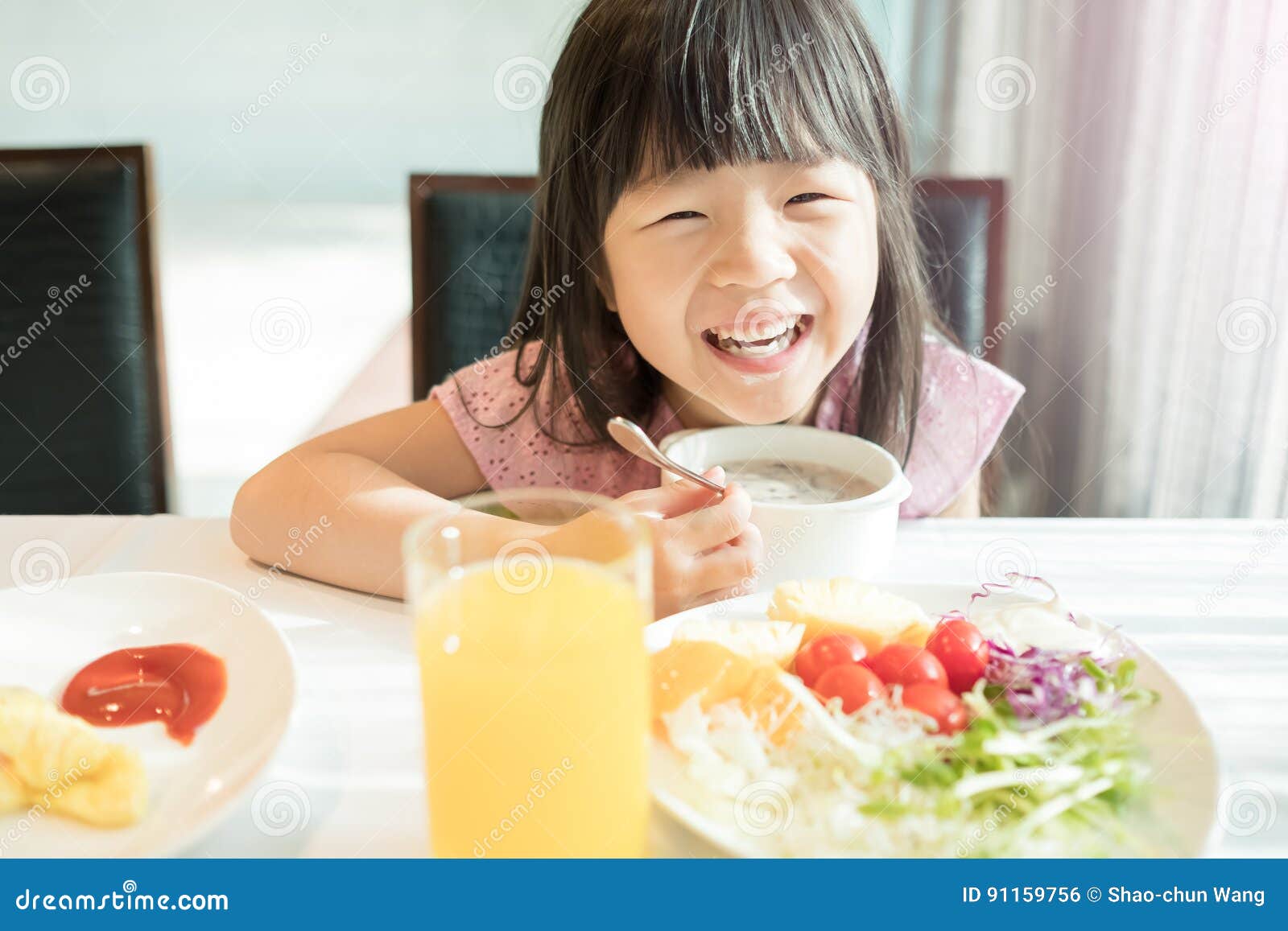 cute girl eat breakfast