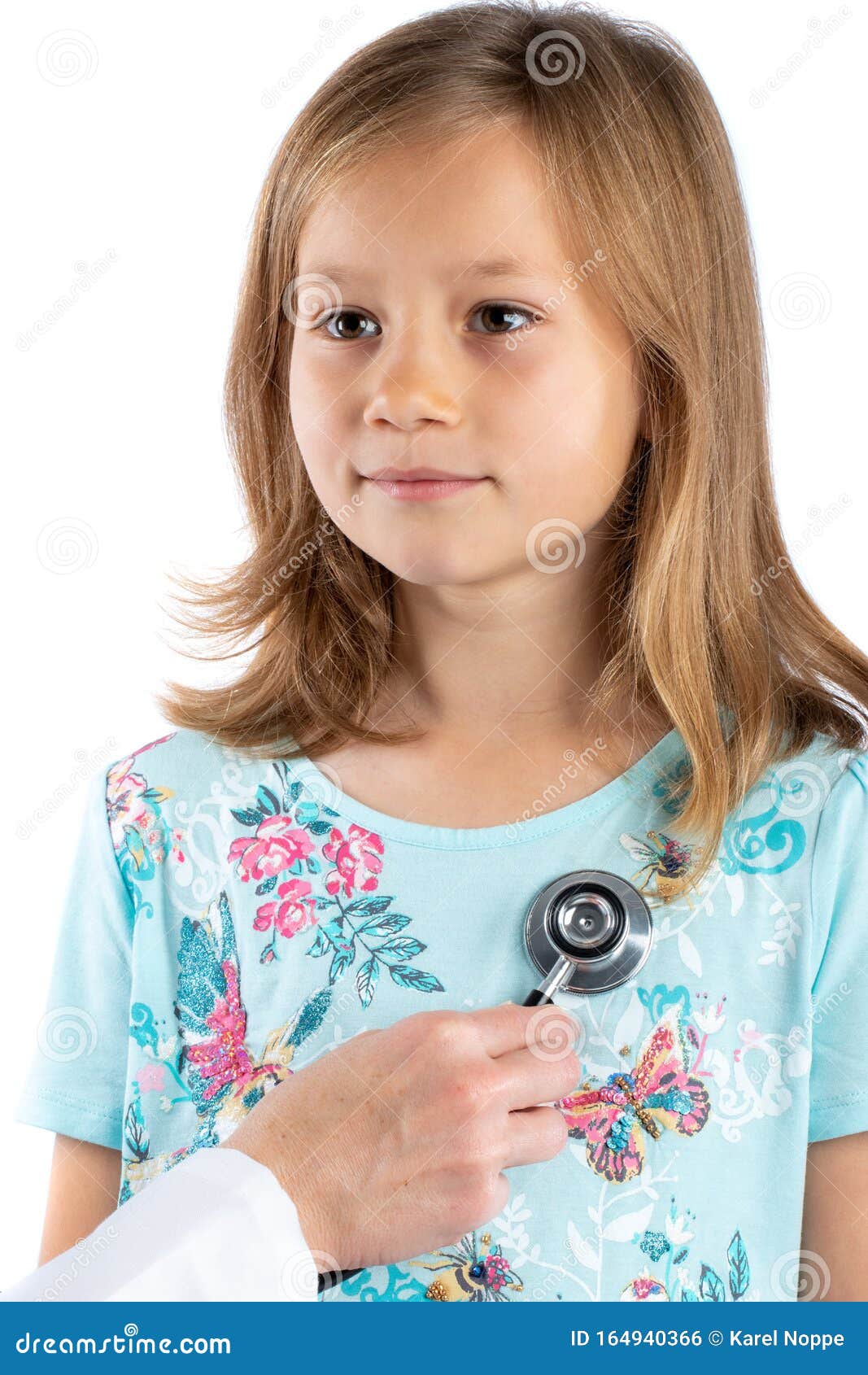 cute girl having cardiovascular auscultation check up