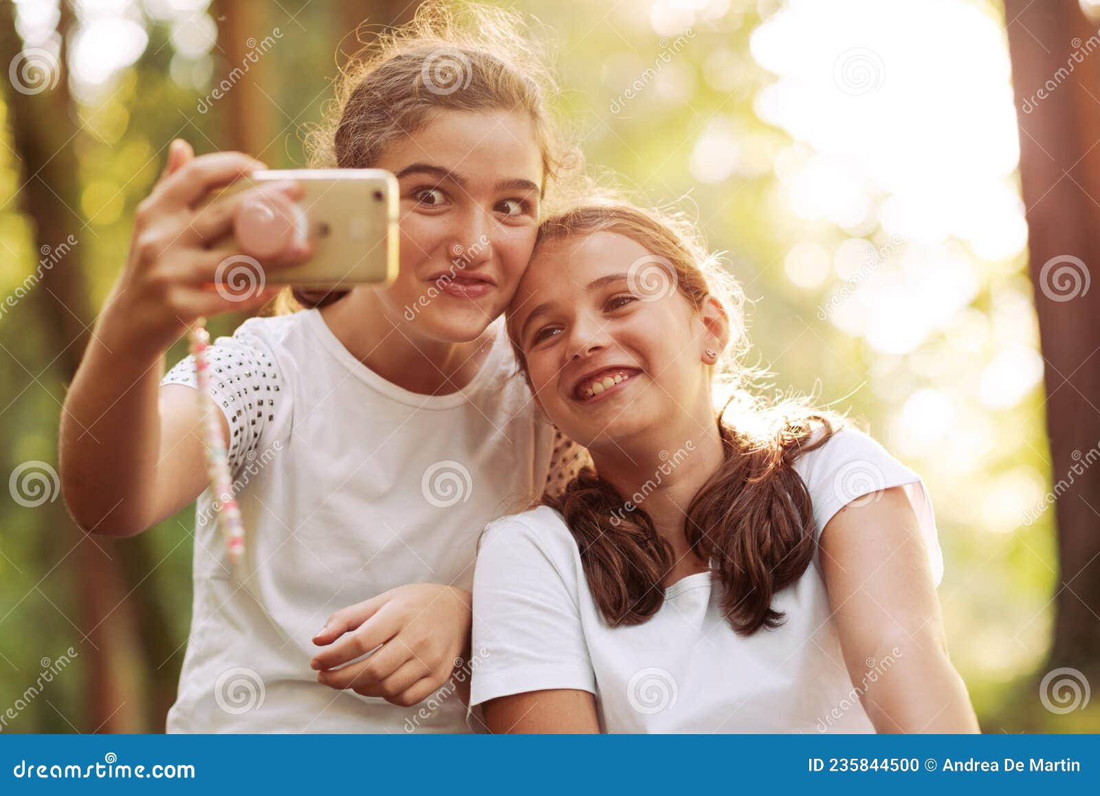 Cute Girls Taking Selfies in the Forest Stock Photo - Image of portrait ...