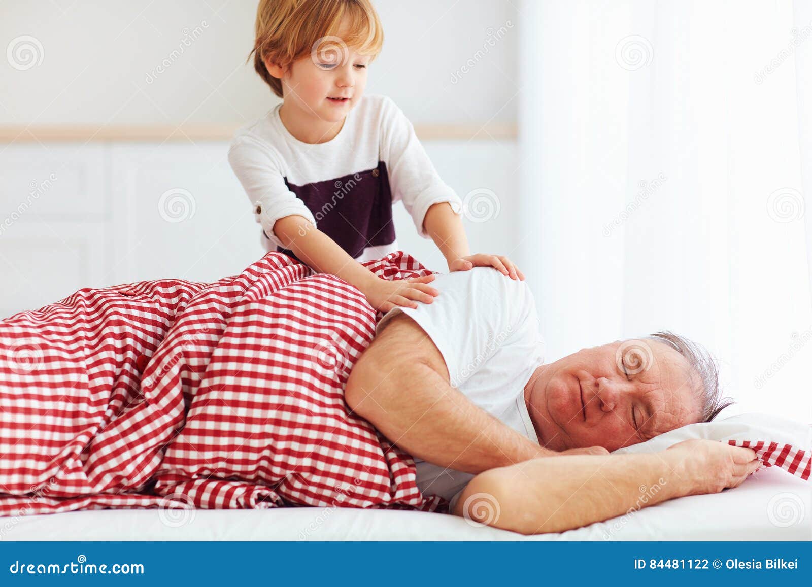 Cute Grandson Gently Wakes Hid Grandpa Up Stock Photo Image of father