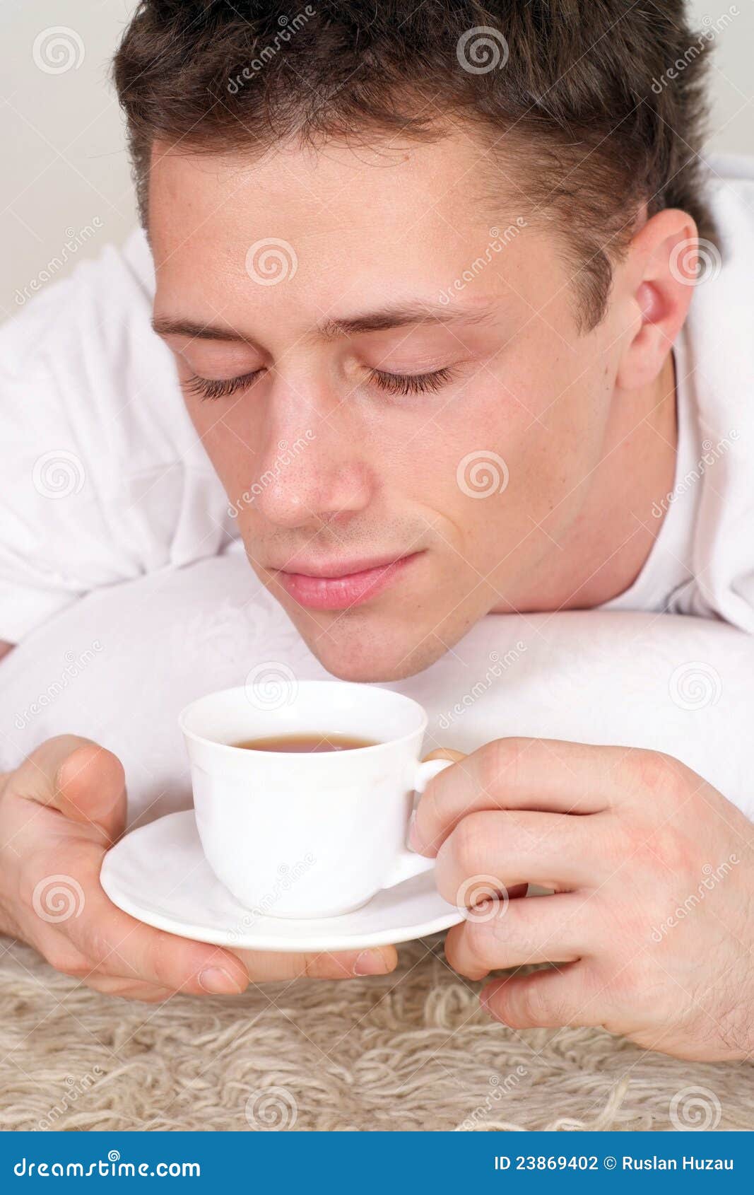 Cute guy with tea. Cute guy with a cup of tea