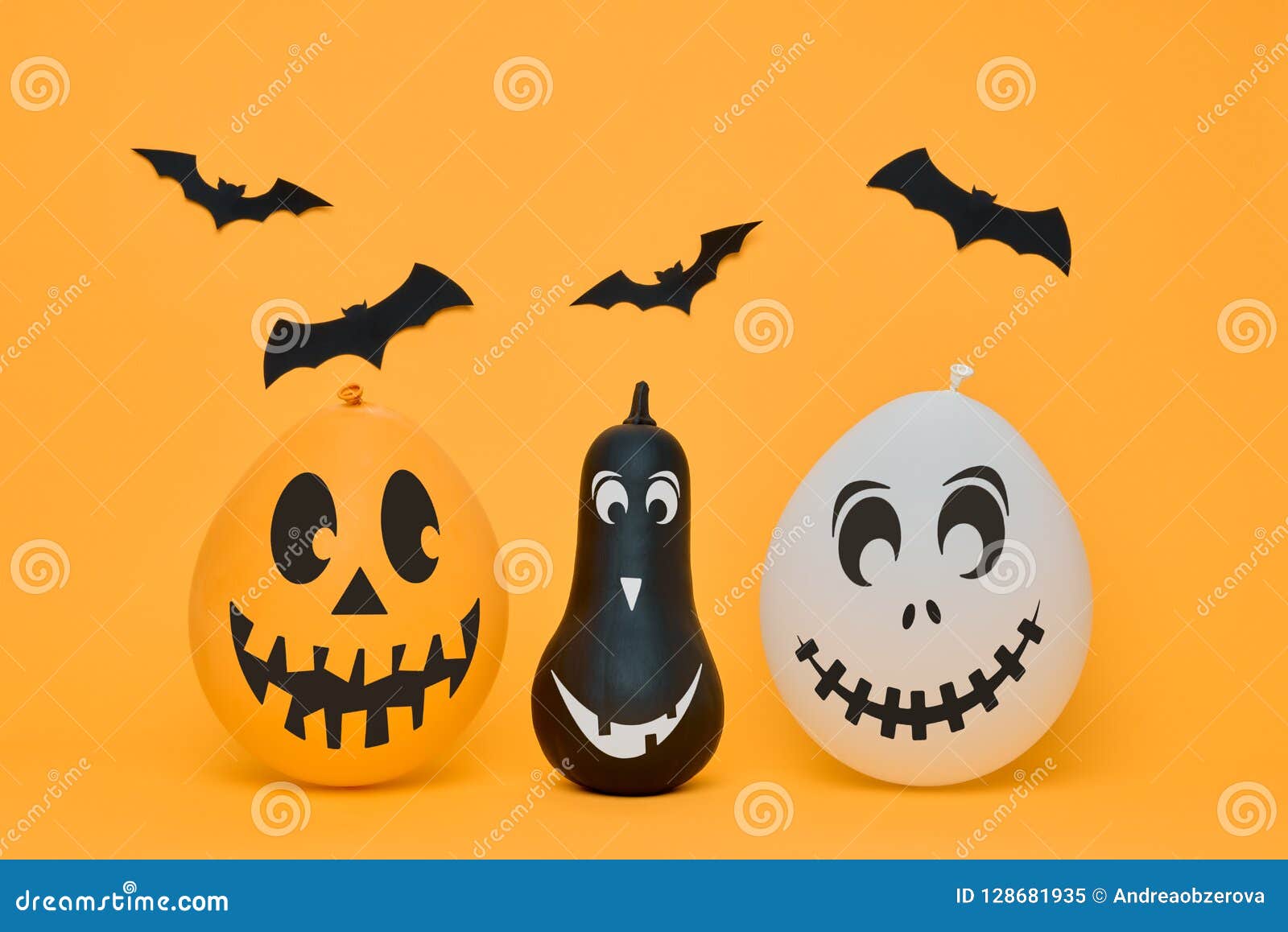 Cute Halloween Pumpkins with Funny Smiling Faces and Paper Bats Flying ...