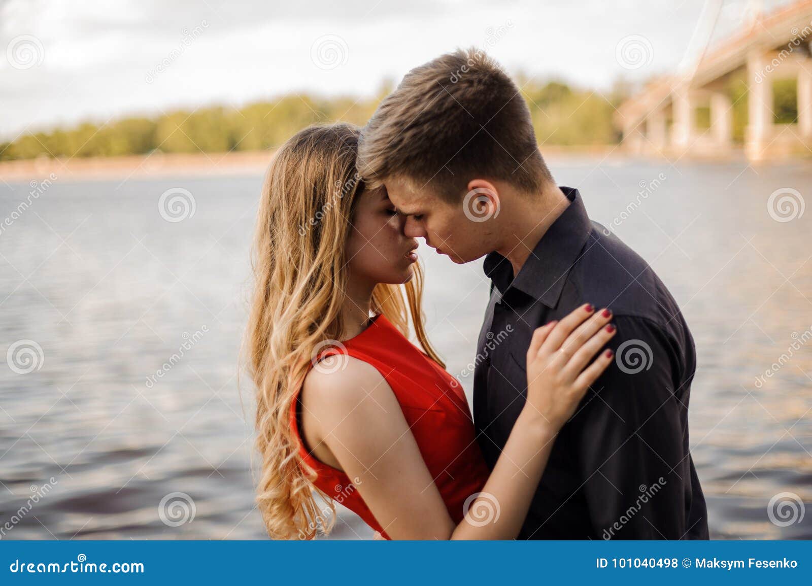 Cute Couple in Love on the Background of Water Stock Photo - Image ...
