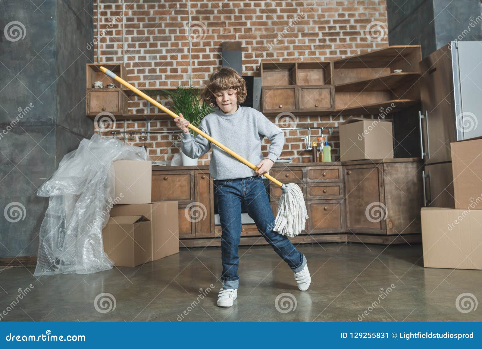 Cute Happy Little Boy Playing with Mop in New Stock Image - Image of ...