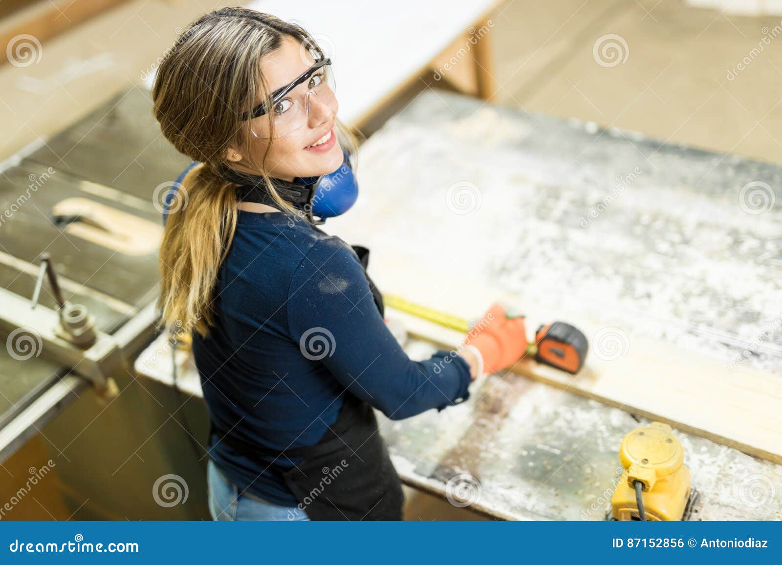 Cute Hispanic Woman Doing Some Woodwork Stock Photo Image Of Machine Glasses 87152856