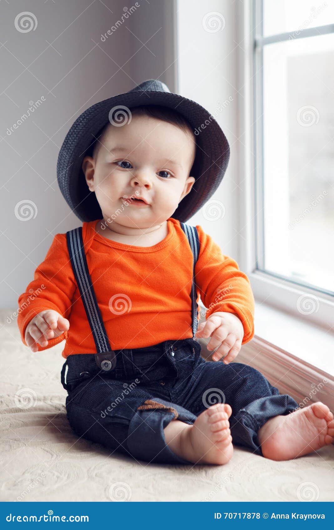 Cute Infant Baby in Hat Near Window Stock Photo - Image of clothes ...