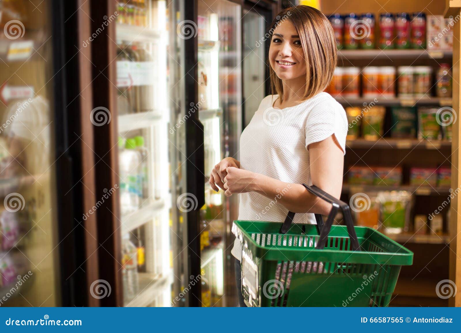 cute latin woman at a supermarket