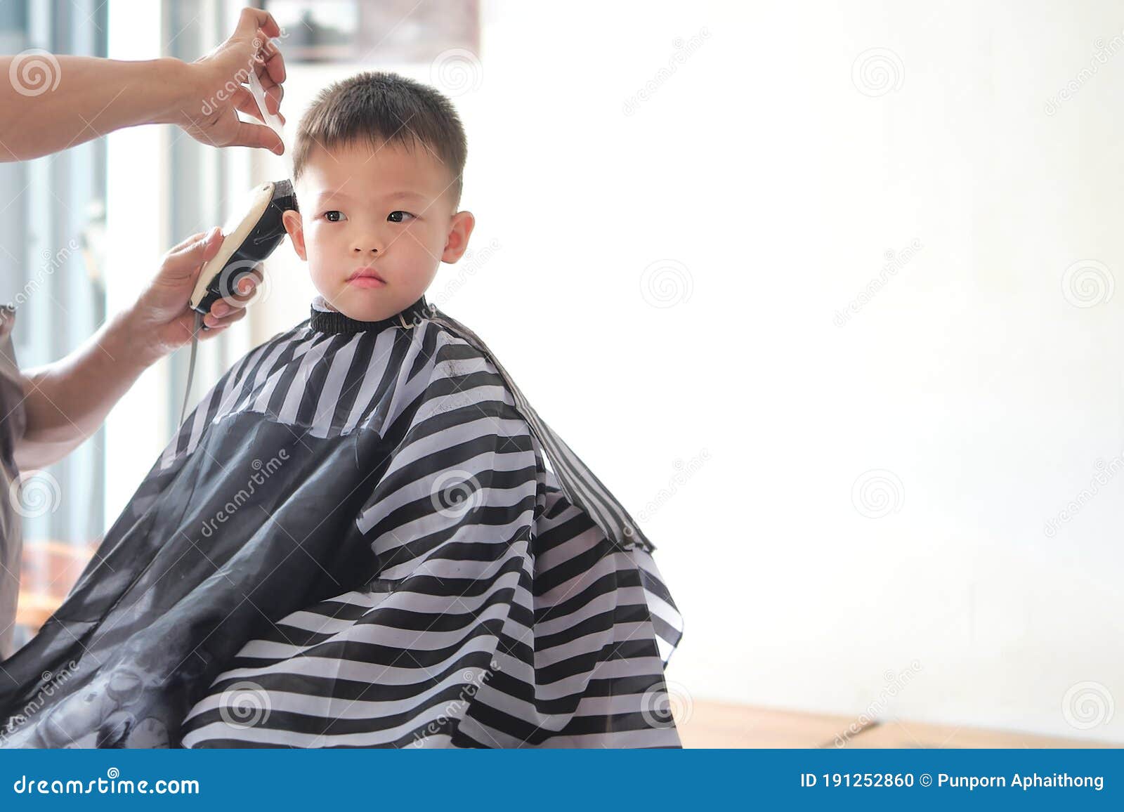 Cute Little Asian Boy Child Getting a Haircut at the Hairdresser`s Barber  Shop, Kid Cut with Hairdresser`s Machine Stock Photo - Image of fashion,  innocence: 191252860