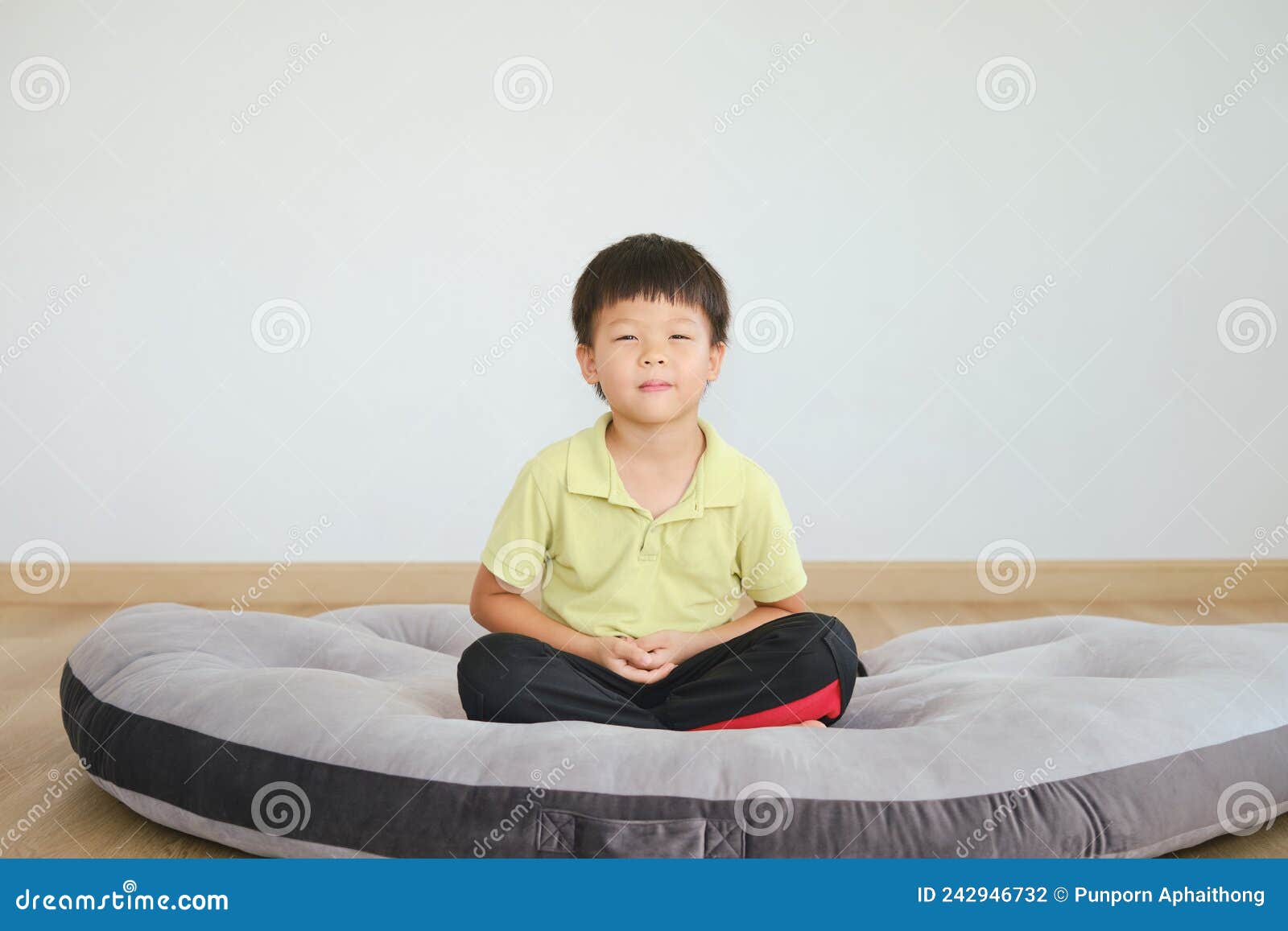 Cute Little Asian Kindergarten Kid, Barefoot Practices Yoga and ...