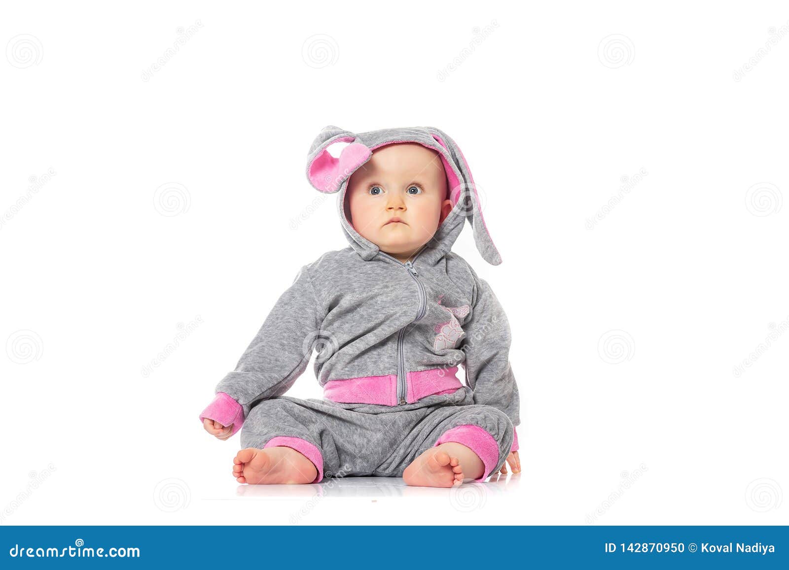  Cute  Little Baby  In Bunny Costume Sitting On White 