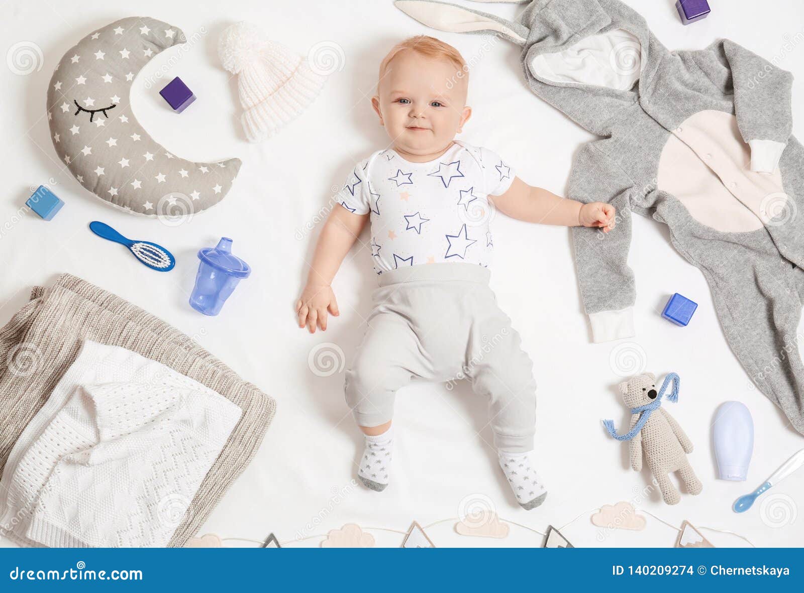 Cute Little Baby with Clothing and Accessories on White Stock Photo ...