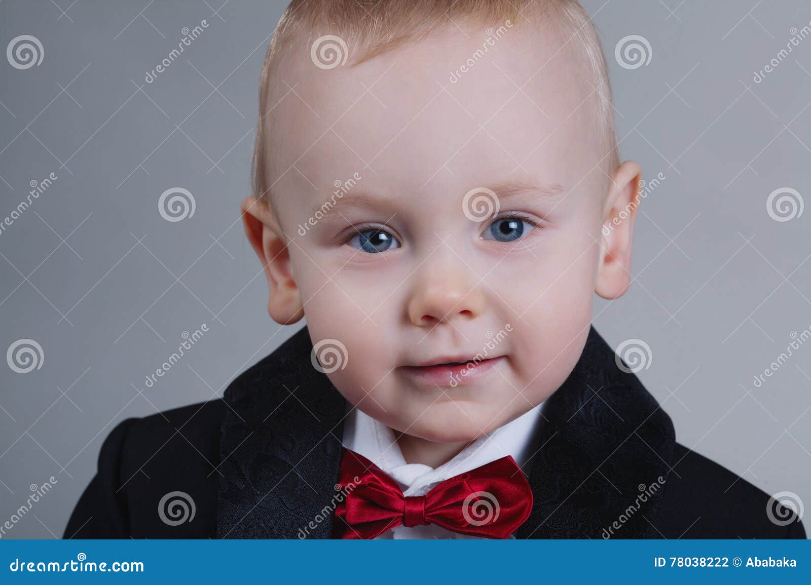 Cute Little Boy with Bow Tie Stock Photo Image of background, child