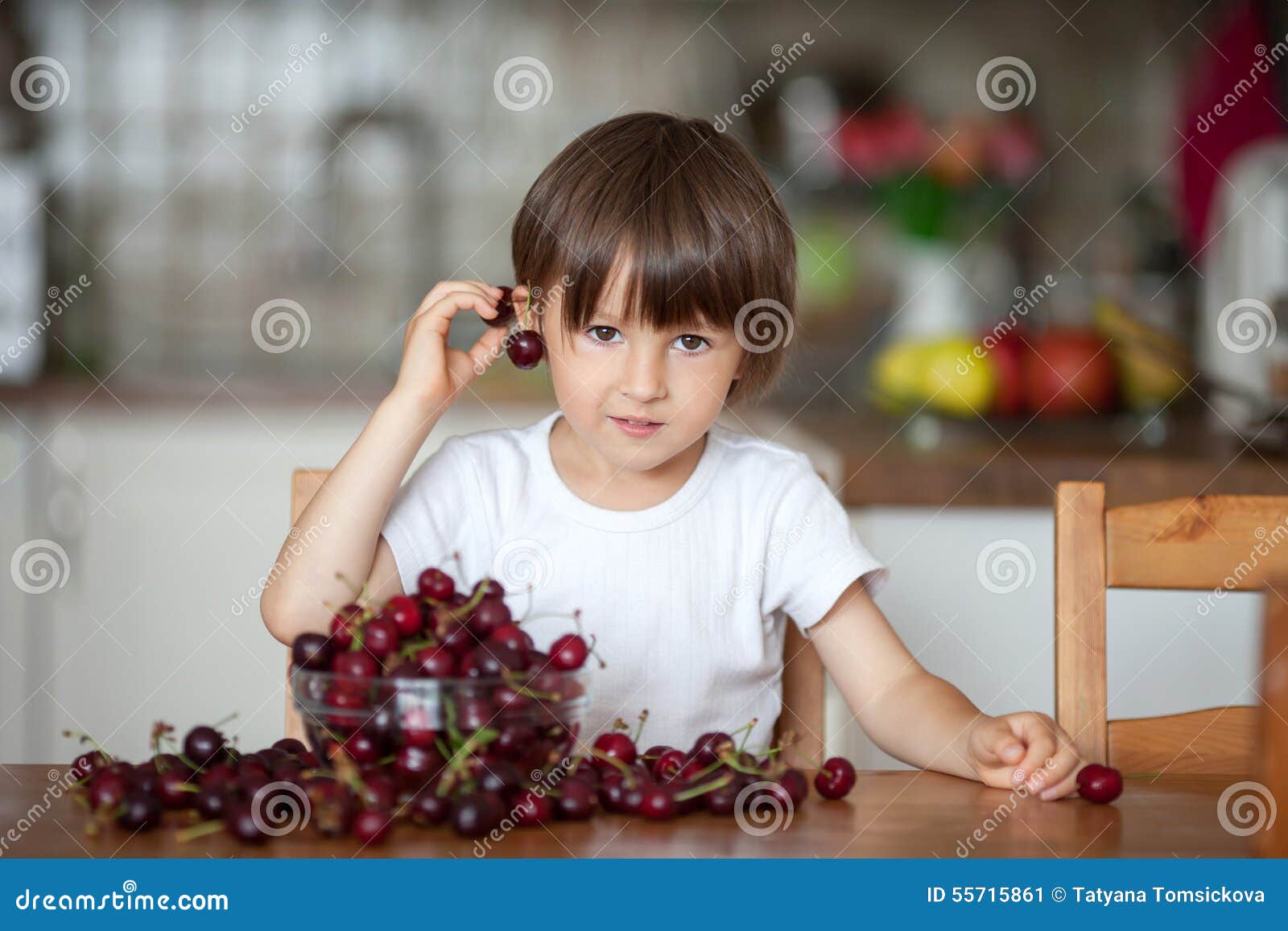 Cute Little Boy, Eating Cherries at Home in the Kitchen, Making Stock Image Image of cherry