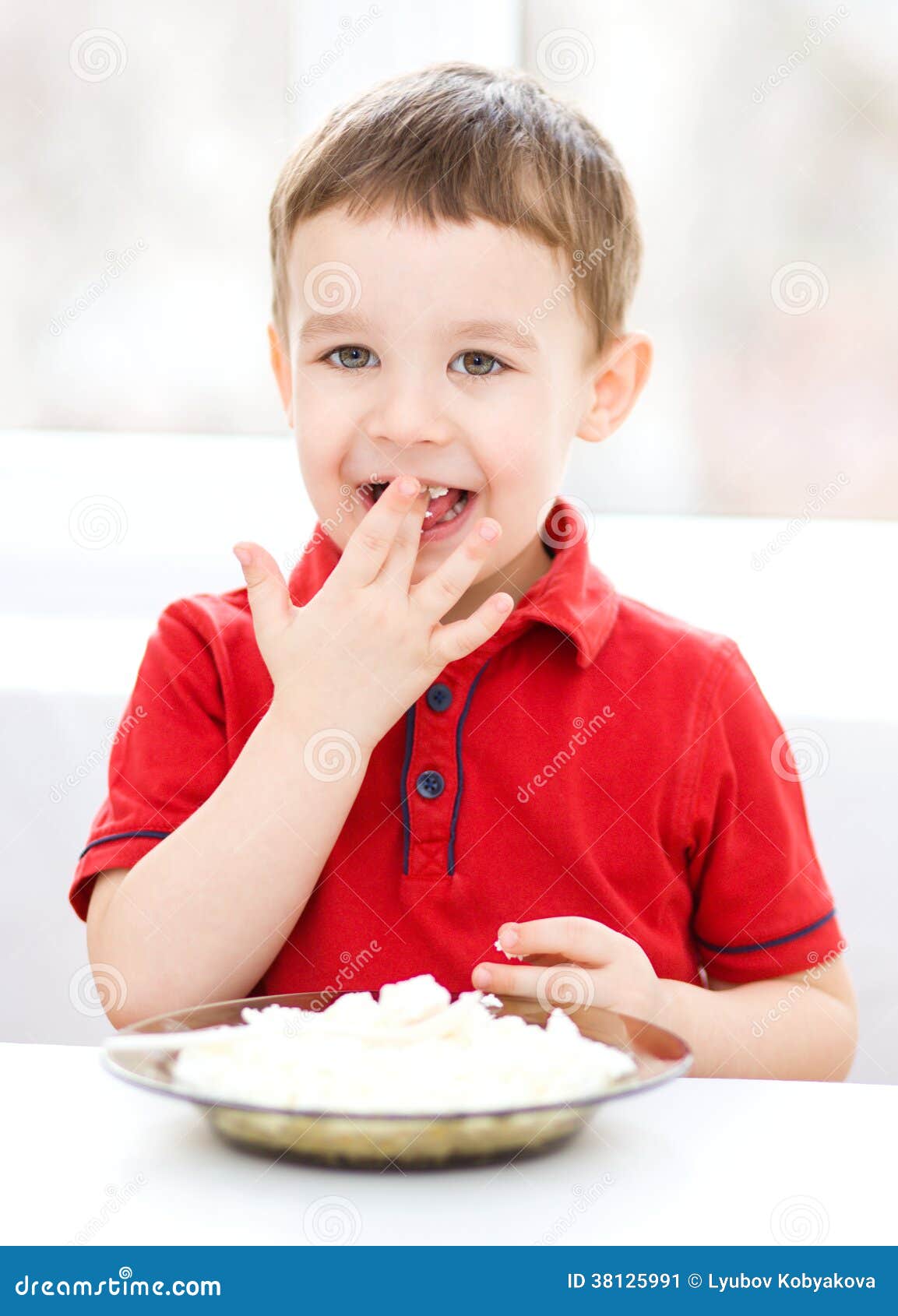 Cute Little Boy is Eating Cottage Cheese Stock Image Image of snack