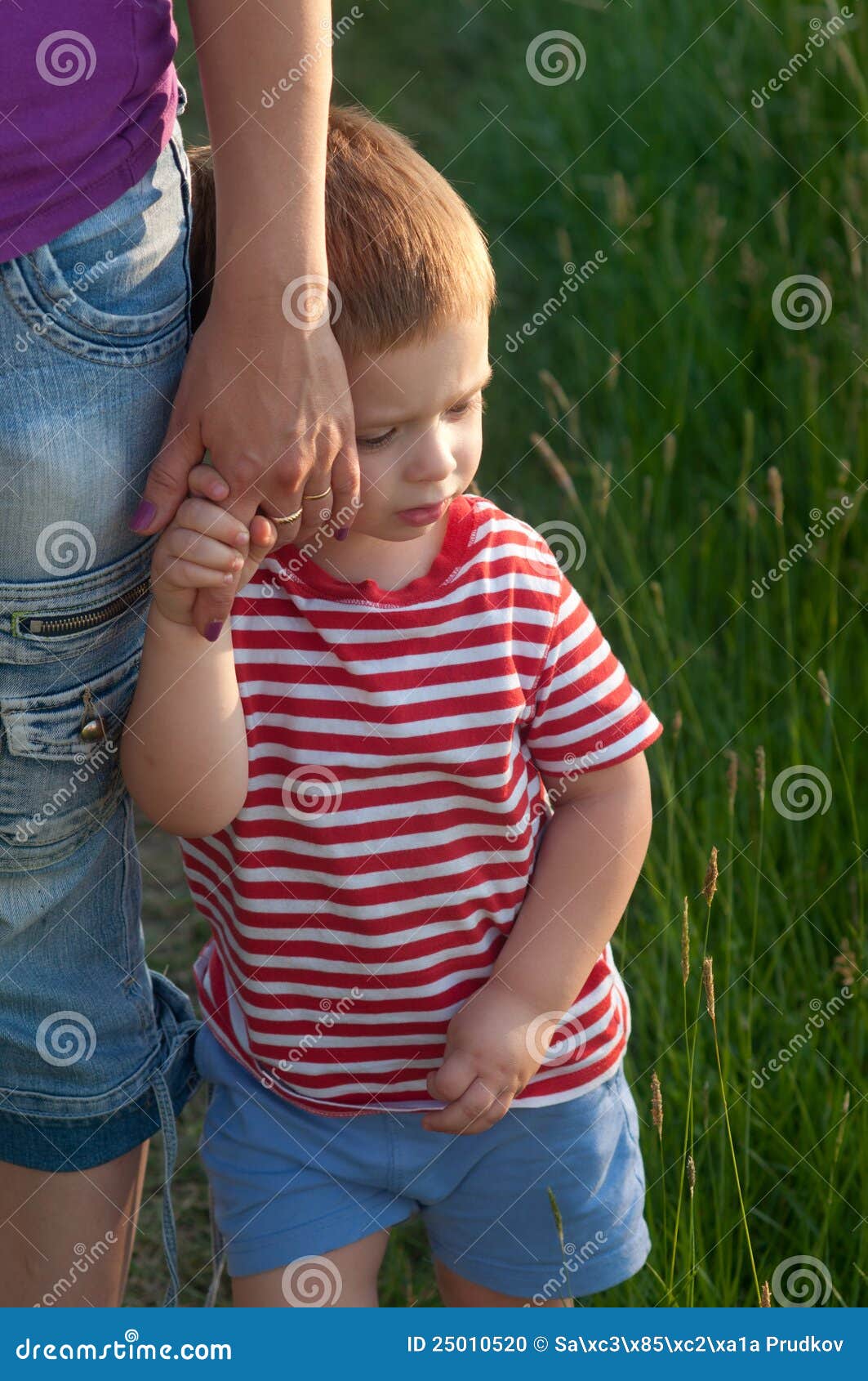 Cute Little Boy Holding Hand of His Mother Stock Photo - Image of ...