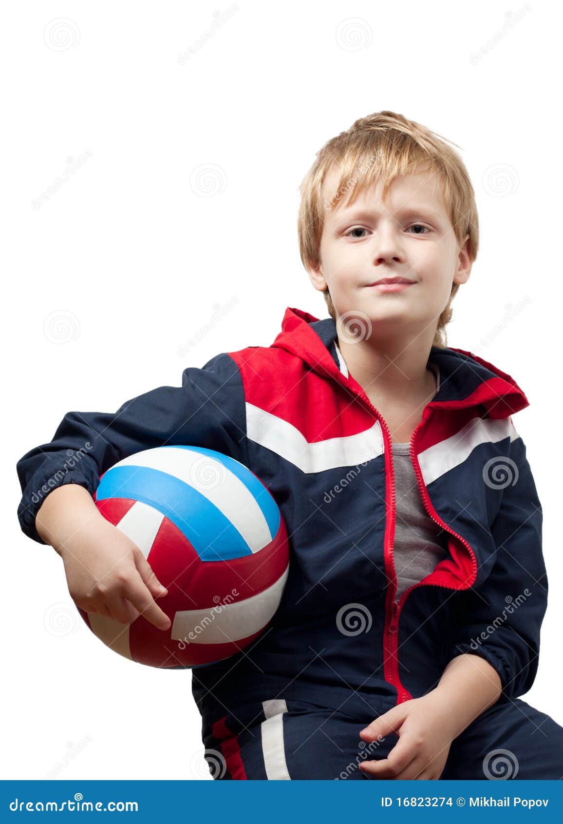 The Cute Little Boy in a Jumpsuit Holds a Volleyba Stock Photo - Image ...