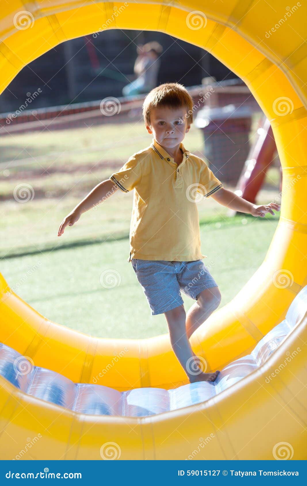 Cute Little Boy, Playing in a Rolling Plastic Cylinder Ring, Ful Stock  Image - Image of people, family: 59015127