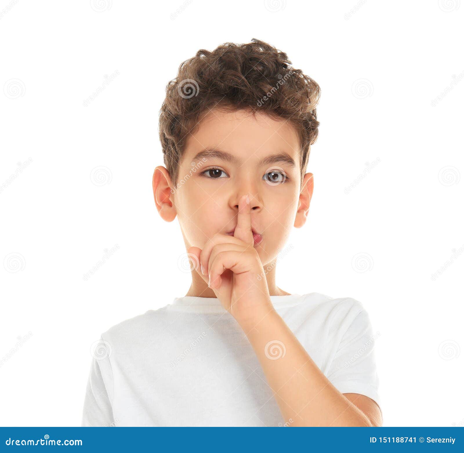 Cute Little Boy Showing Silence Gesture on White Background Stock Image