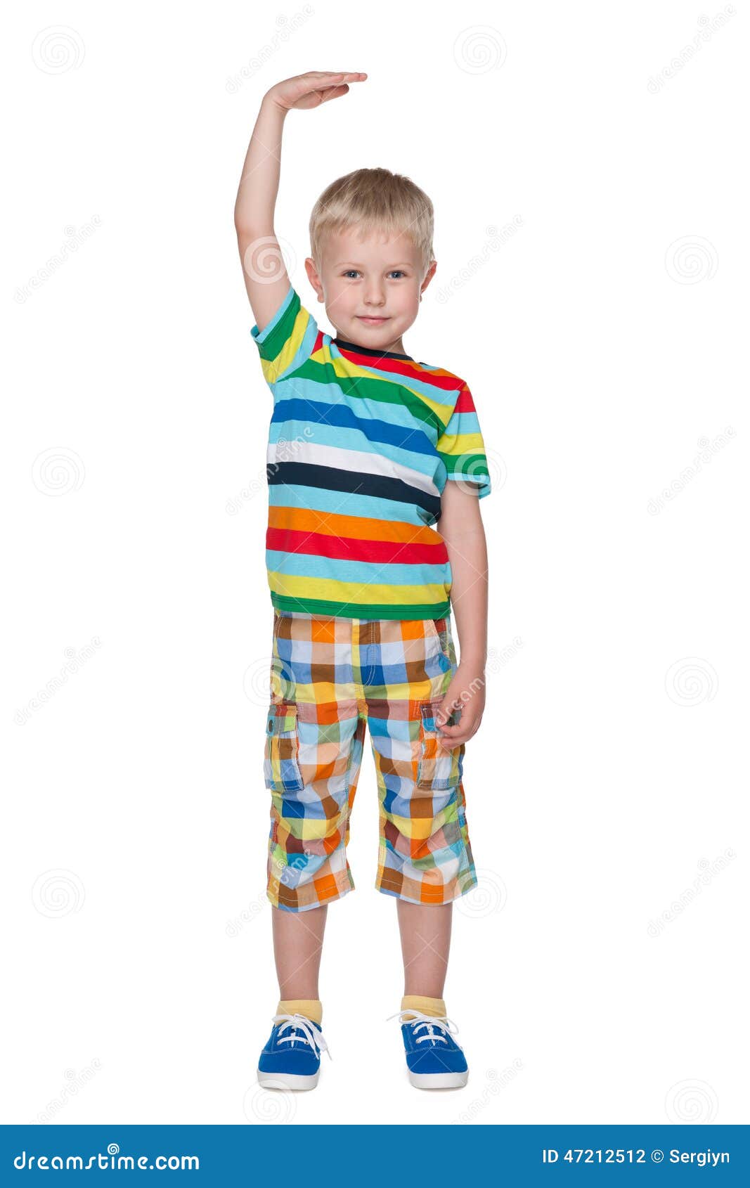 A Cute Little Boy Shows How he is Tall Stock Photo Image of little
