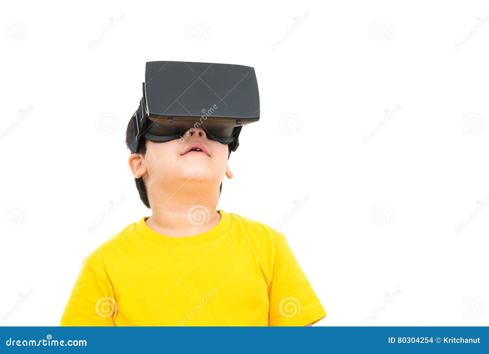 Cute little boy wearing VR or Virtual Reality headset. Cute little boy watching video on VR or Virtual Reality glasses