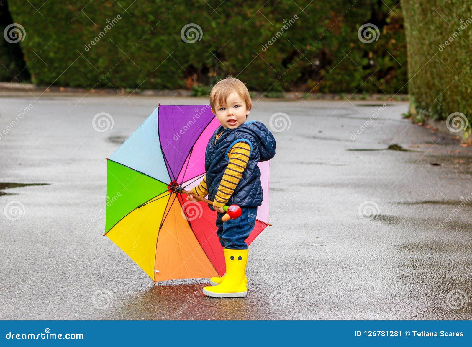 Cute Little Boy in Yellow Rubber Boots with Colorful Rainbow Umbrella ...