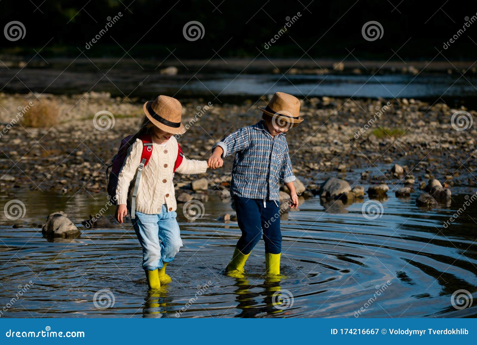 Cute Little Children Holding Hands and Playing on River Together ...