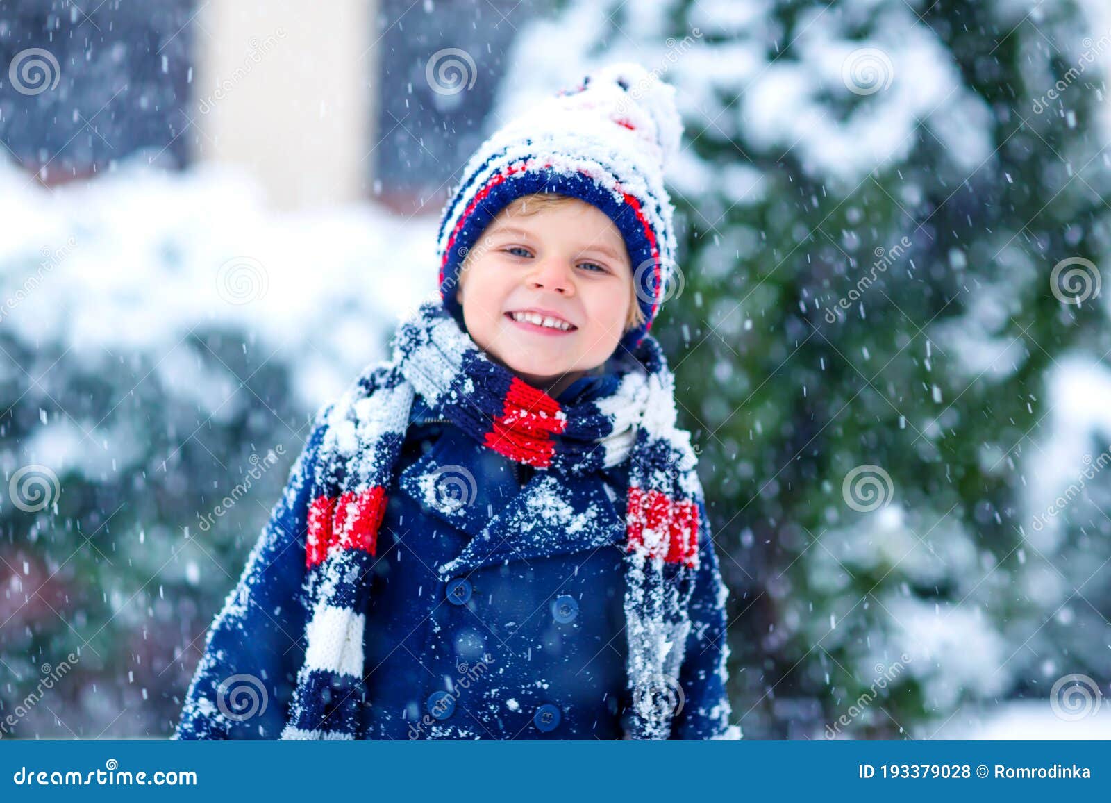 Cute Little Funny Child in Colorful Winter Fashion Clothes Having