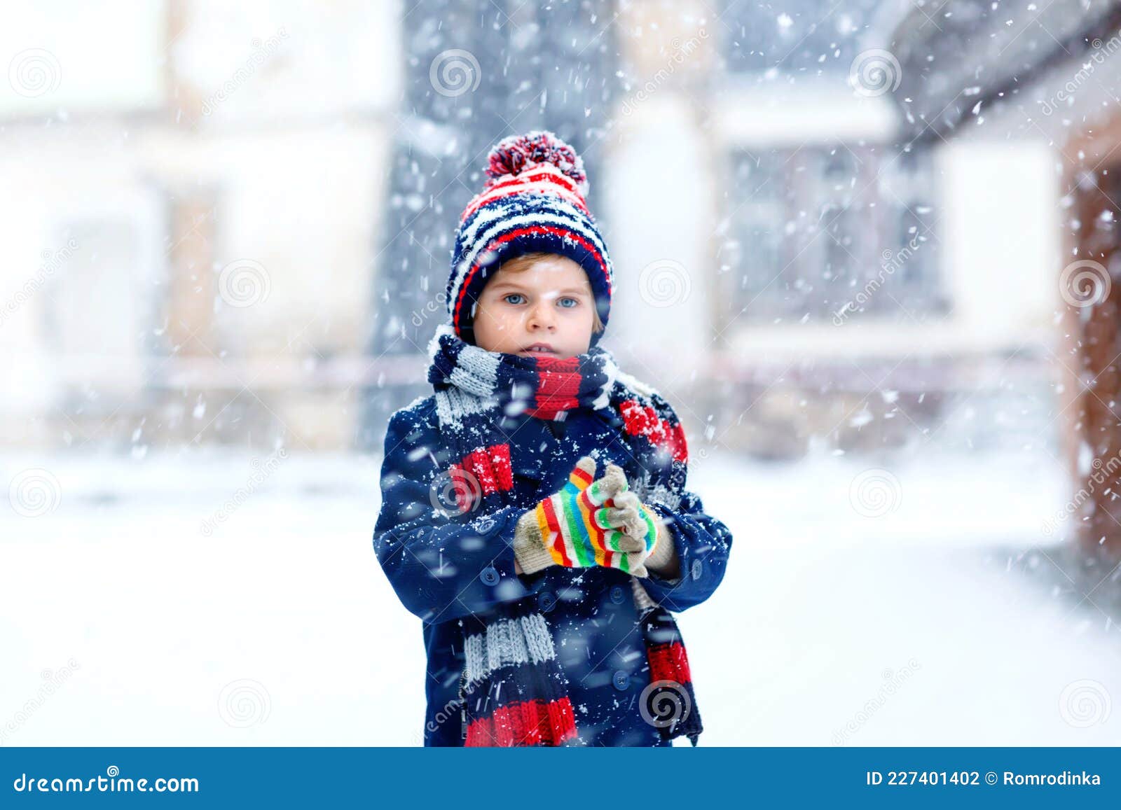 Cute Little Funny Child in Colorful Winter Fashion Clothes Having Fun and  Playing with Snow, Outdoors during Snowfall Stock Photo - Image of  cheerful, casual: 227401402