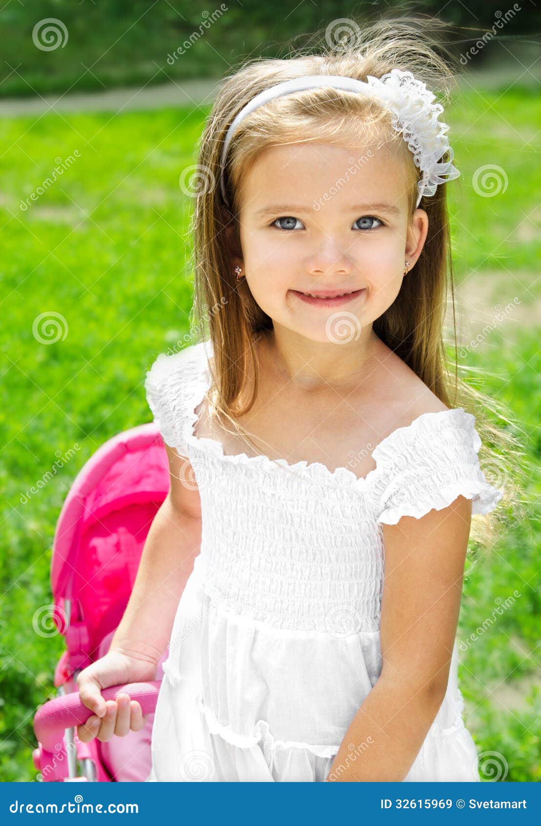 Cute Little Girl with Her Toy Carriage and Doll Stock Image - Image of ...