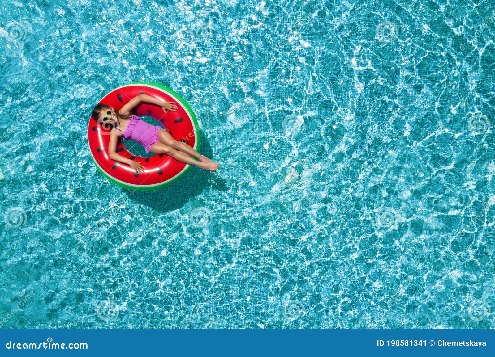 Cute Little Girl with Inflatable Ring in Swimming Pool. Space for Text ...