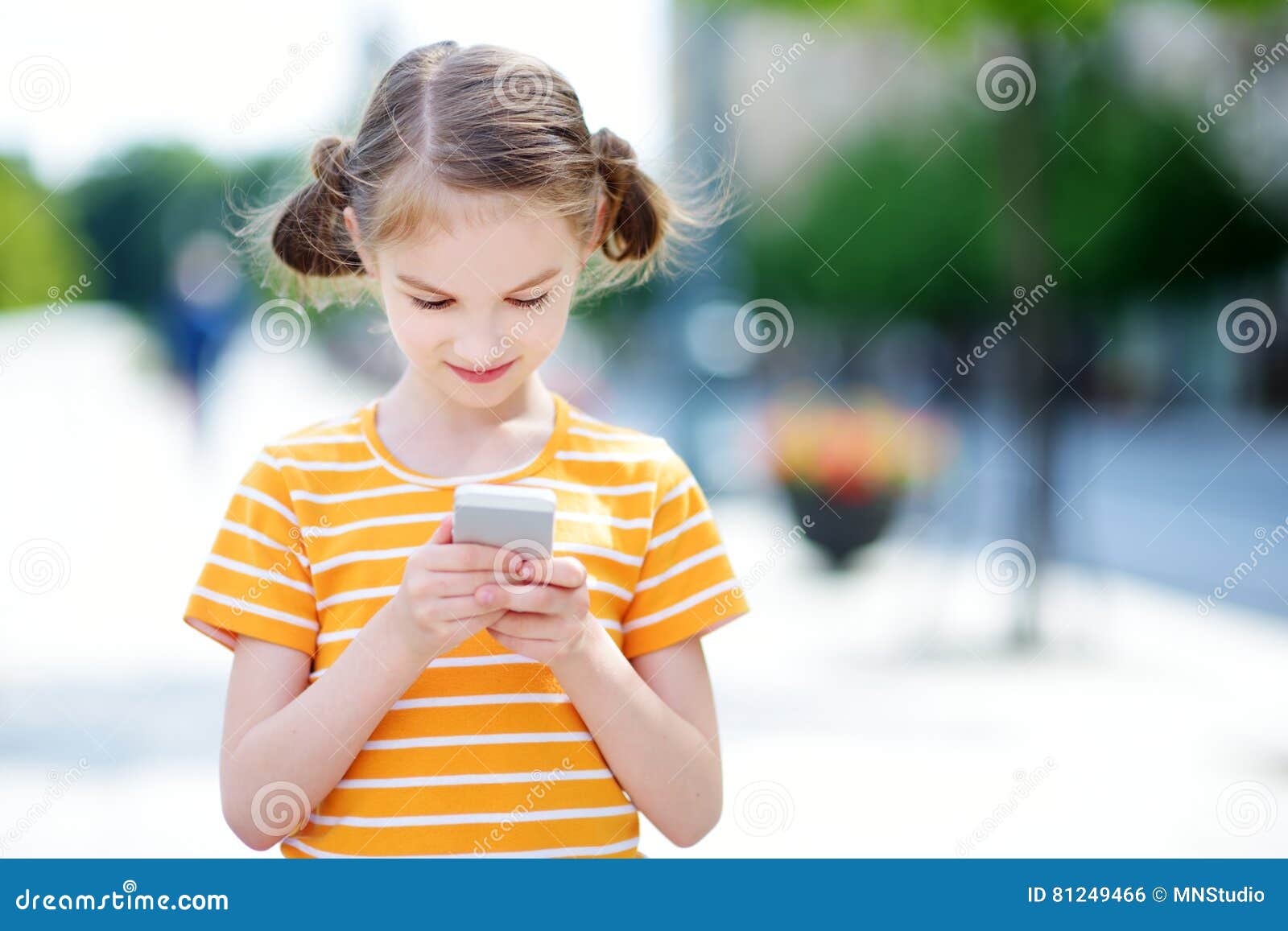 Young Girl Use Phone during School Break. Girl Play Online Games Stock  Image - Image of cute, game: 151348601
