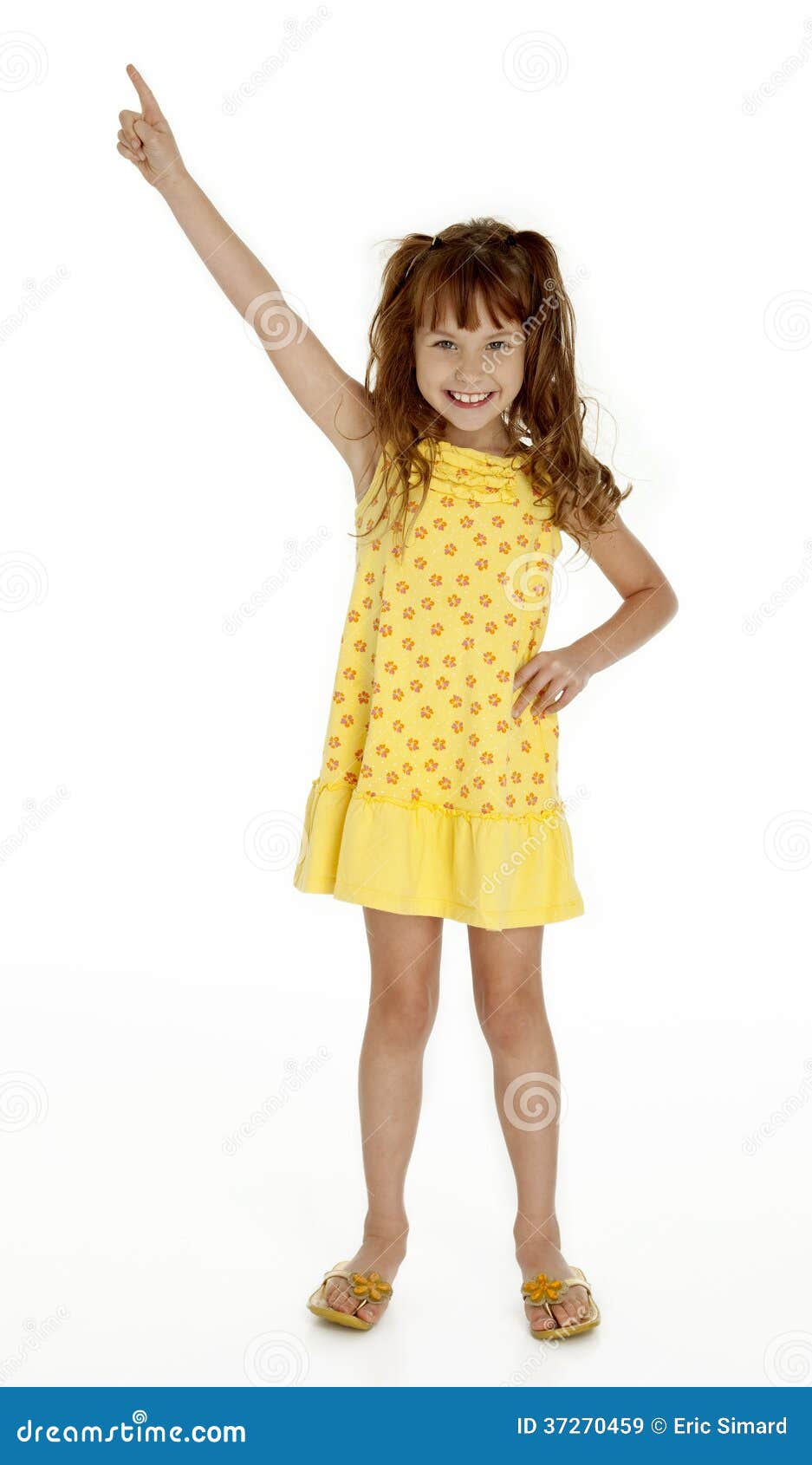 cute little girl pointing upward