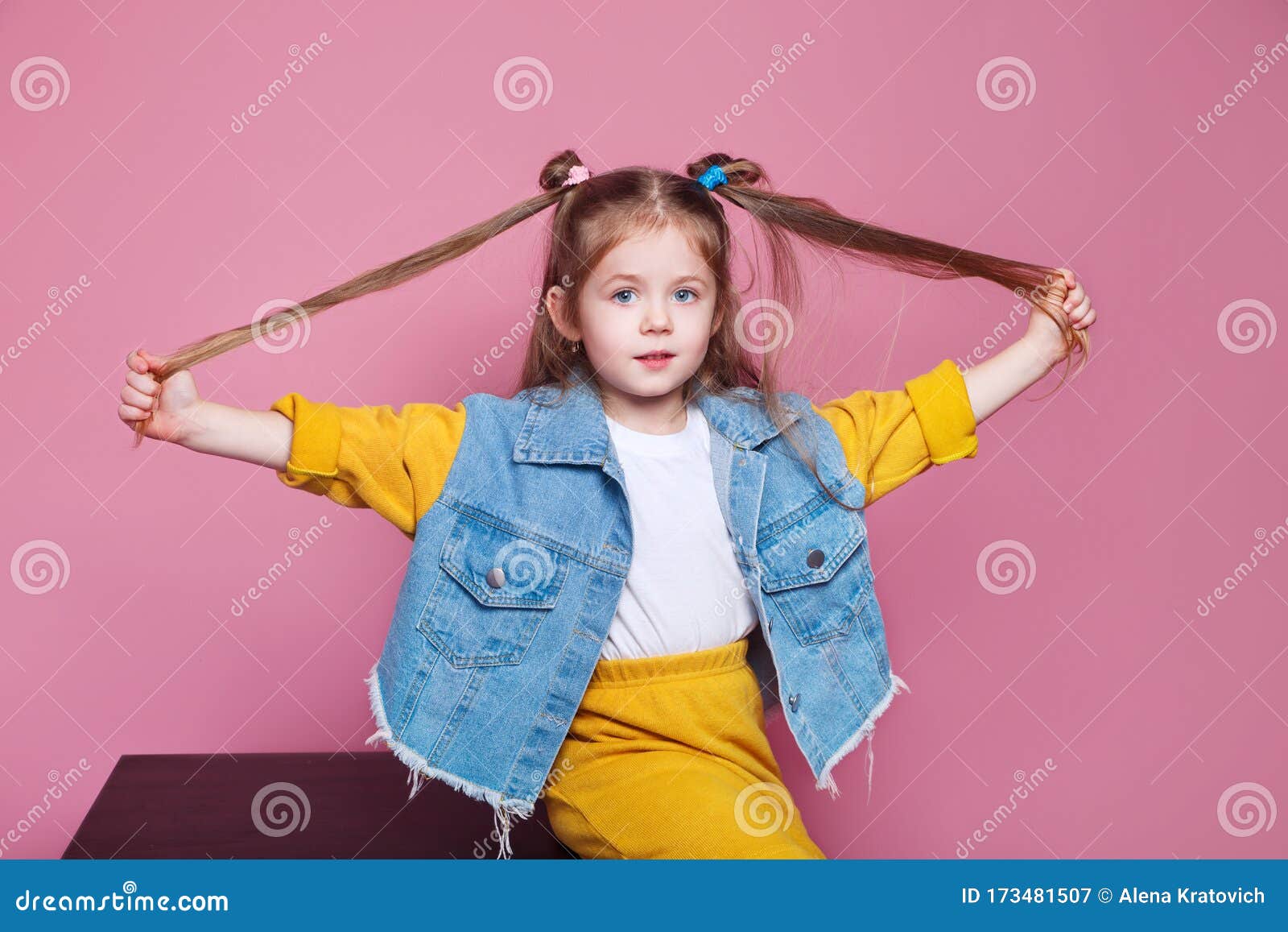 Little Girl Pulling Up Her Shirt