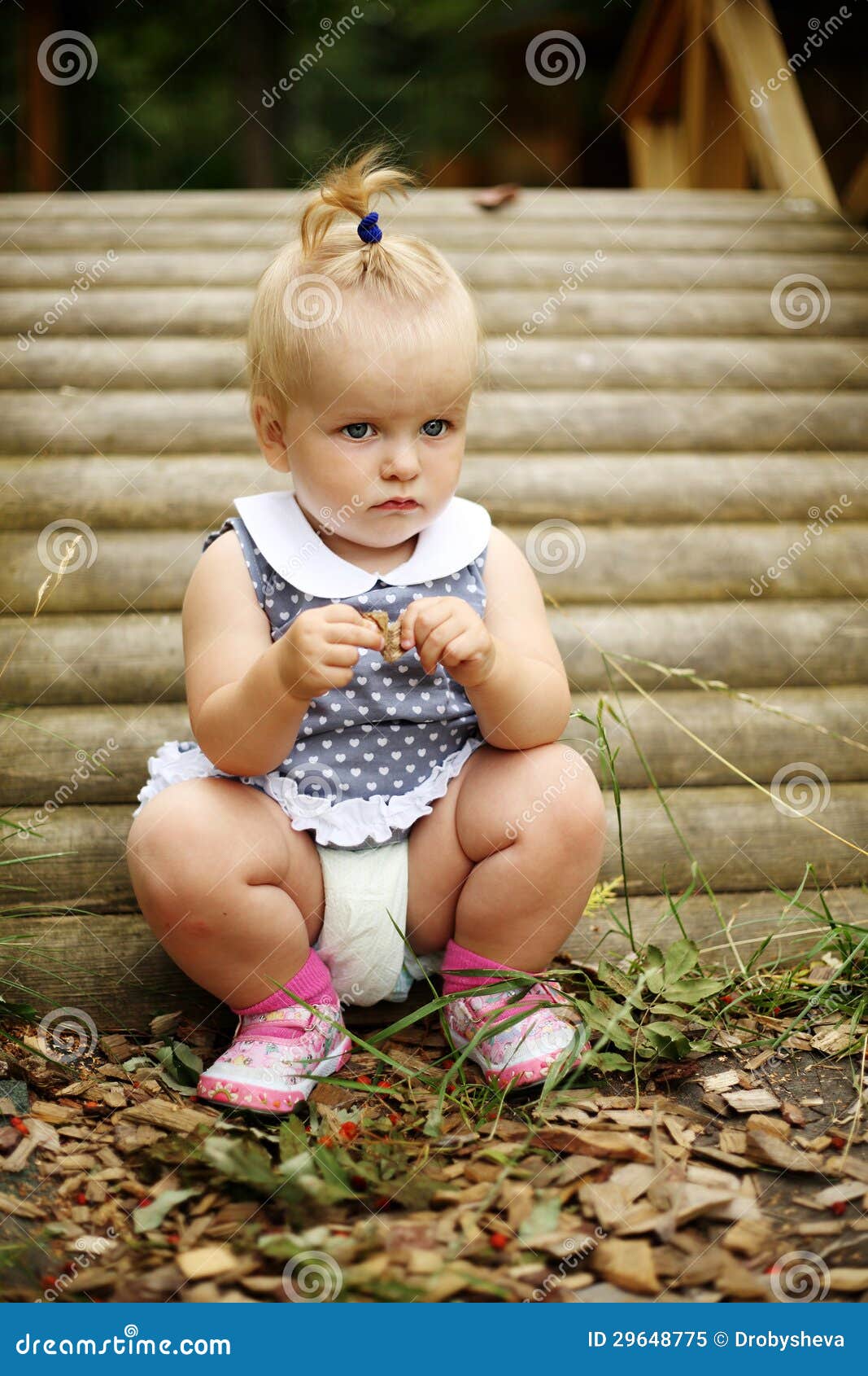 Cute Little Girl Siting Near the Bridge Stock Image - Image of foliage ...