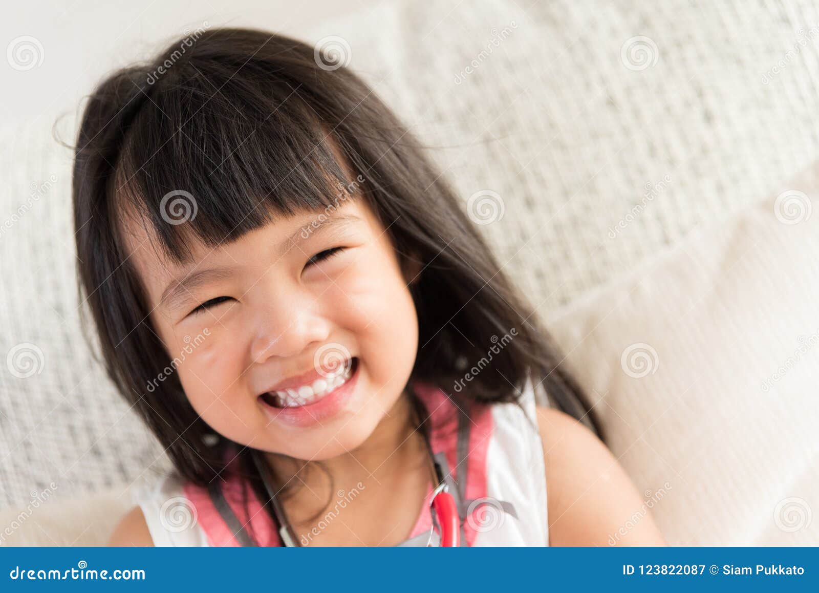 Cute Little Girl is Smiling and Playing Doctor with Stethoscope. Stock ...