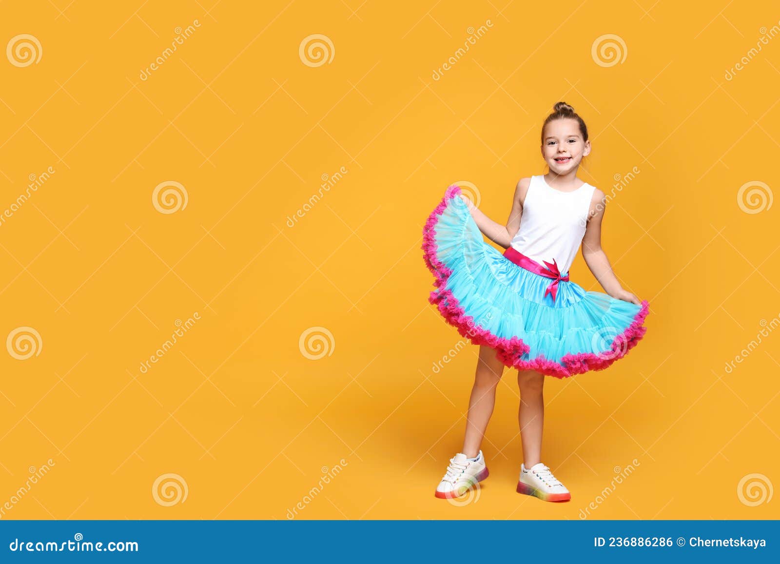 9. Little girl with blond hair and a tutu dancing - wide 9