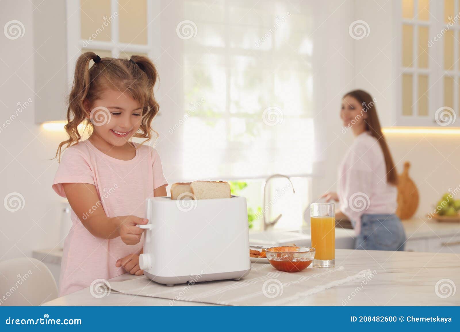 Cute Little Girl Using Toaster at Table in Kitchen Stock Photo Image of child, lunch 208482600
