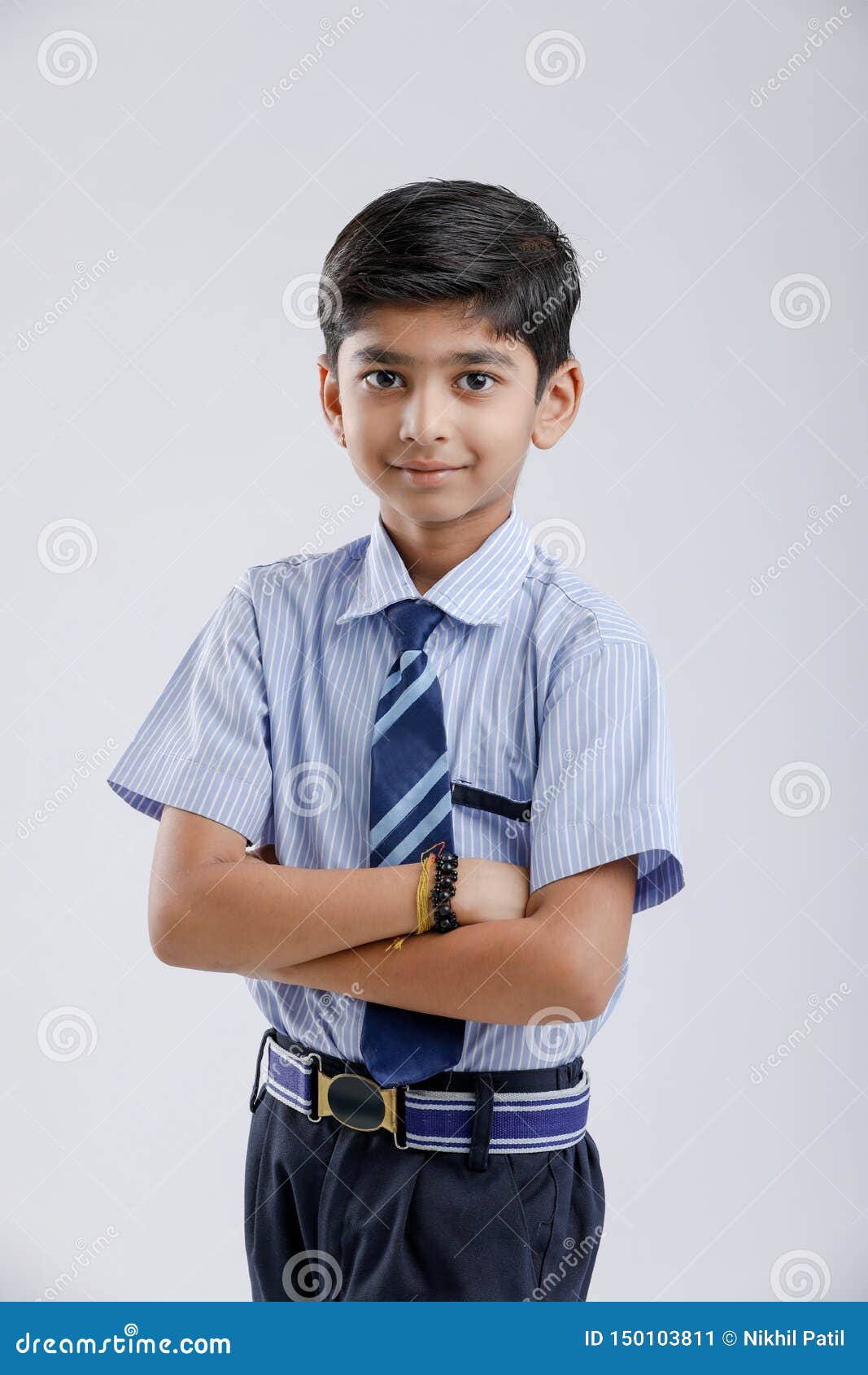 Cute Little Indian / Asian School Boy Wearing Uniform And Spectacles Stock  Photo, Picture and Royalty Free Image. Image 124419158.
