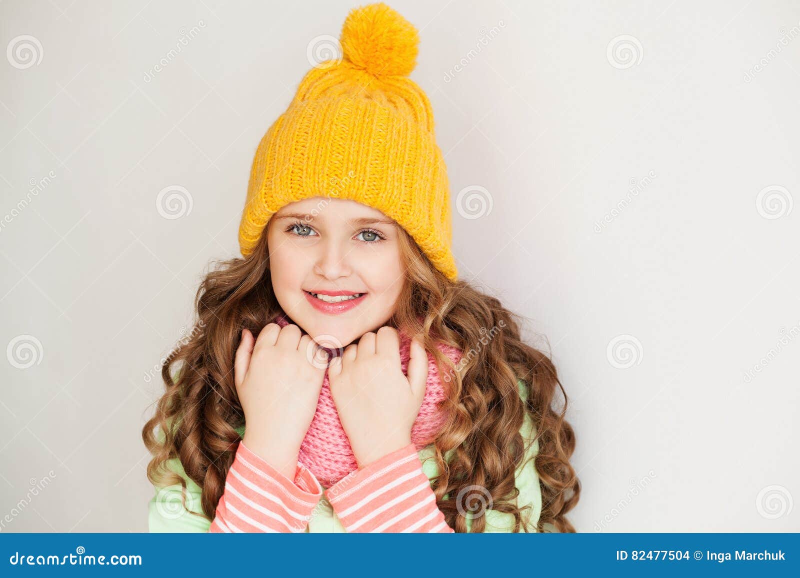 Cute Little Lady Wearing Yellow Woolen Cap and Warm Scarf Stock Photo ...