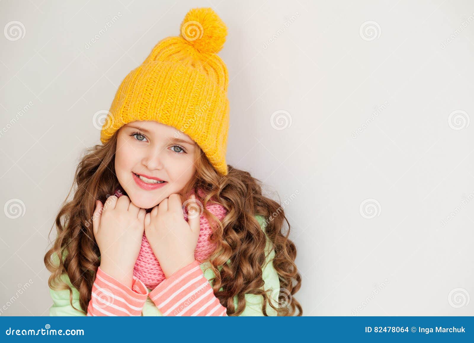 Cute Little Lady Wearing Yellow Woolen Cap and Warm Scarf Stock Photo ...