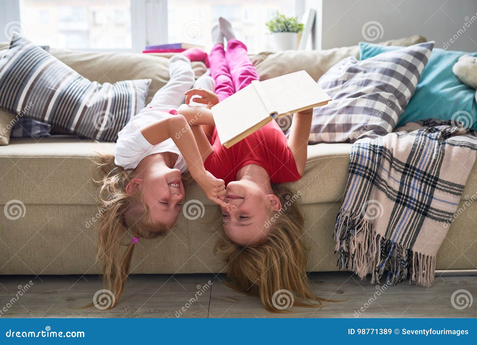 Cute Little Sisters Playing Together Stock Image Image Of Love Sofa