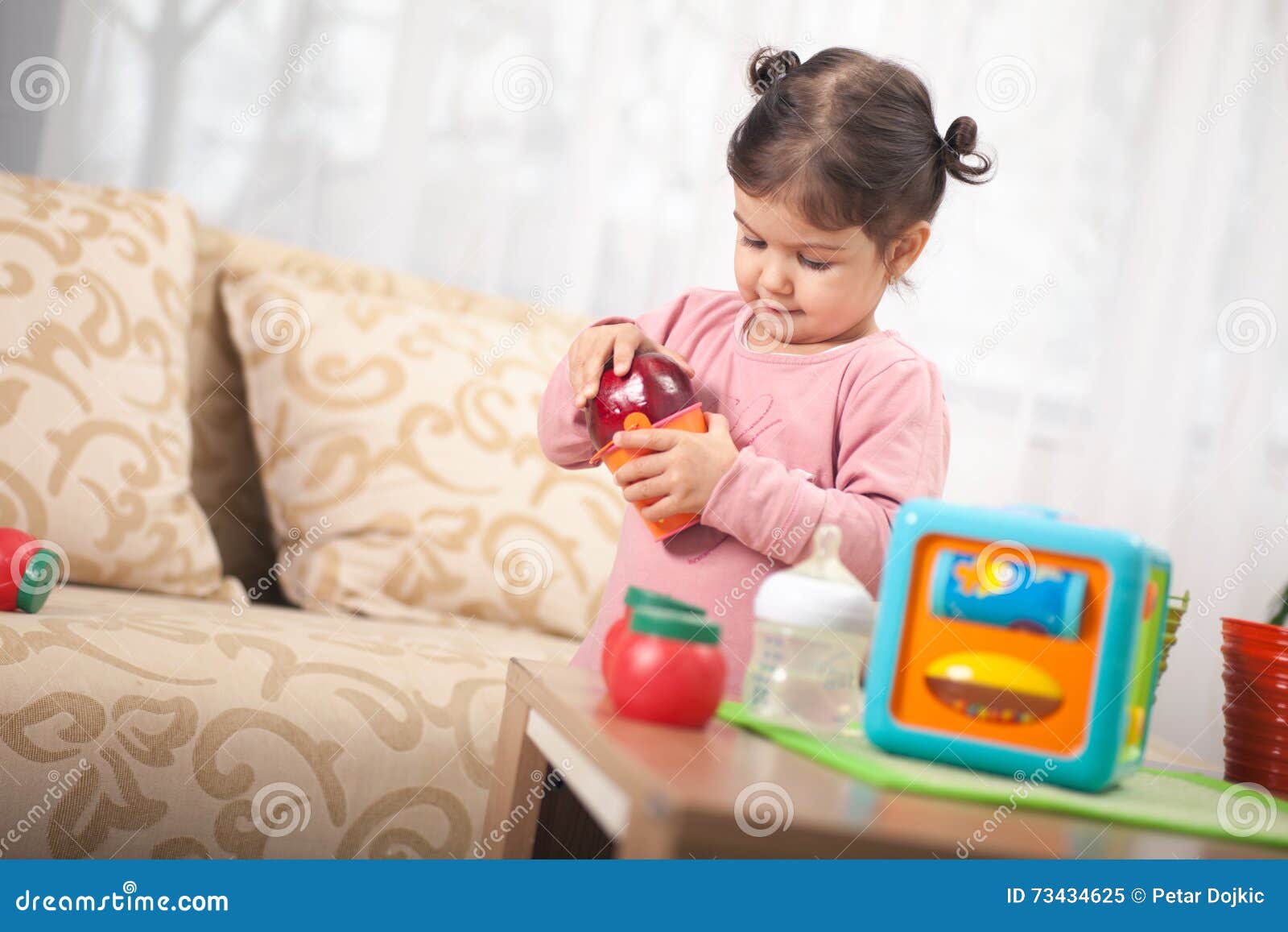 Cute Little Toddler Girl Playing With Toy In Room Child And Toy Stock