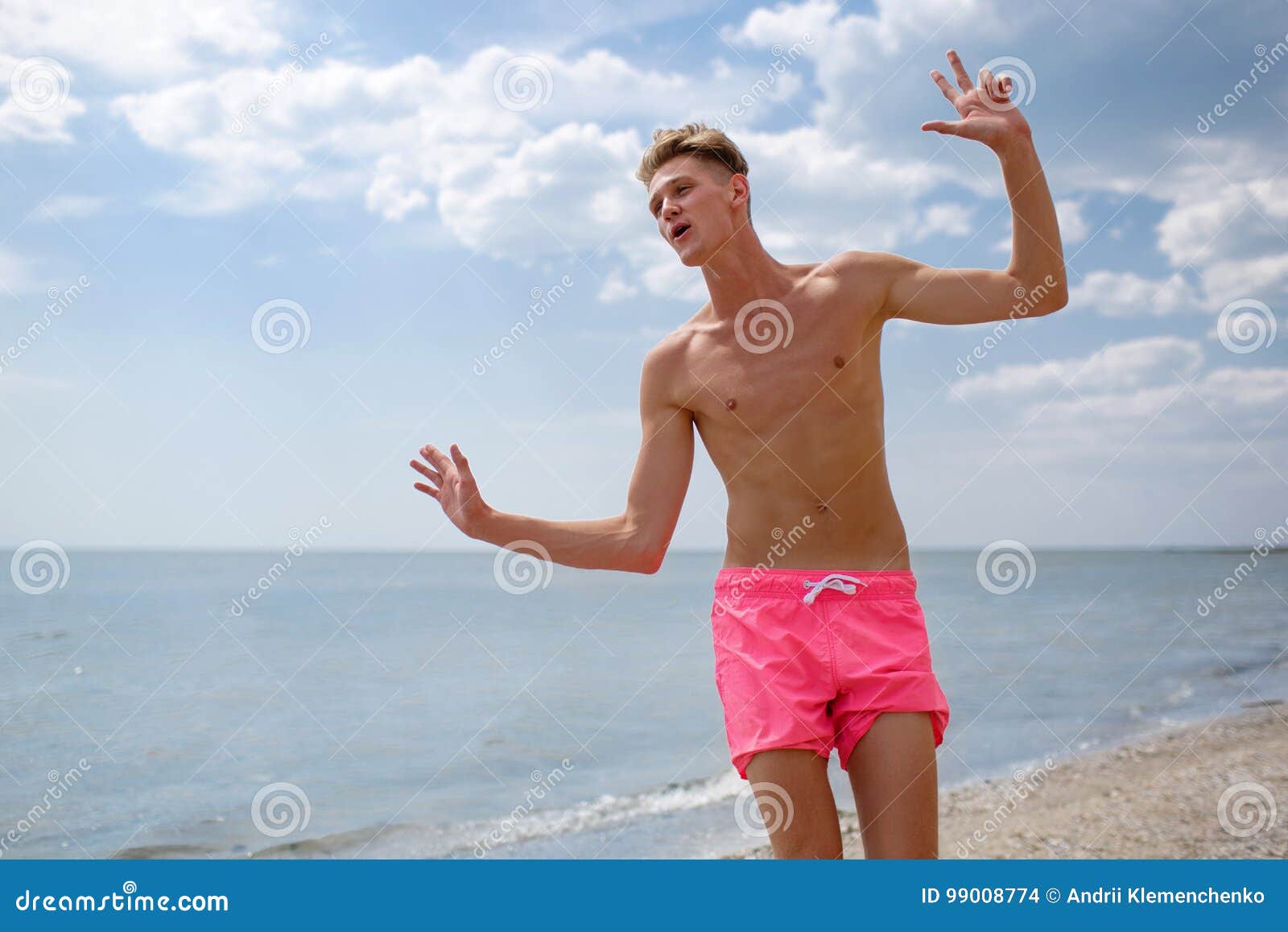 Teenager Shorts On River Bank Squints Stock Photo 577601293