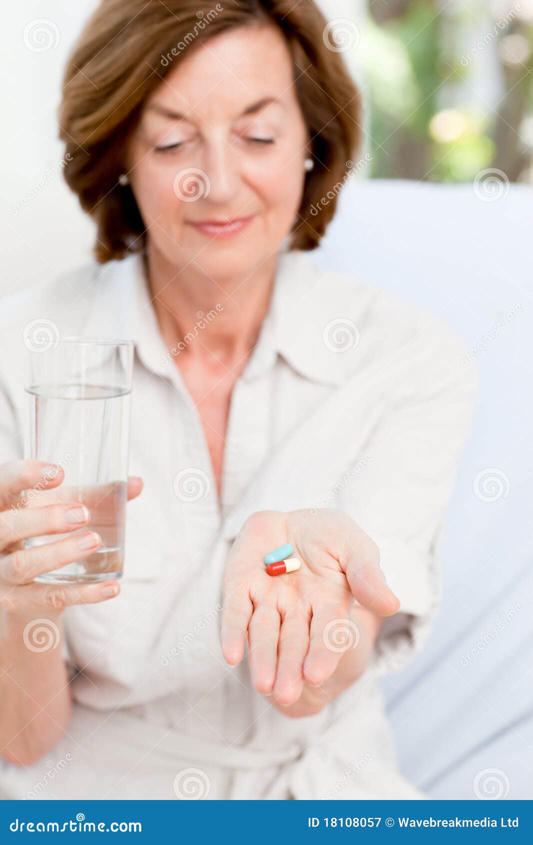 Cute Mature Woman With Pills Royalty Free Stock