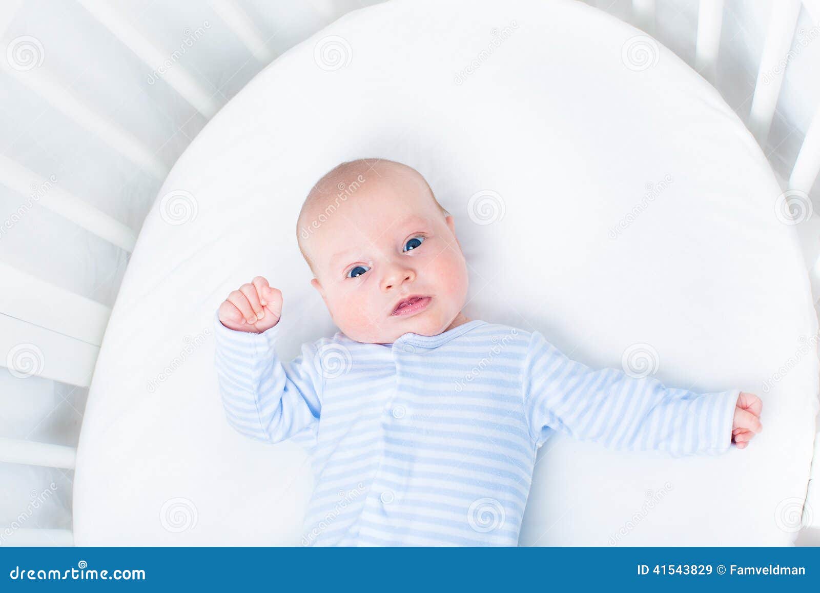 Cute Newborn Baby Boy In A White Round Crib Stock Image 