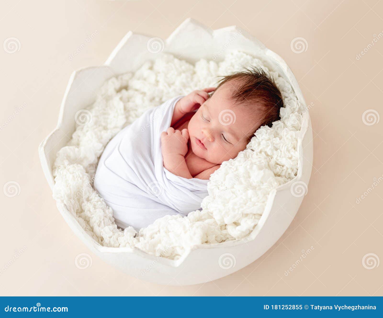 Cute newborn in egg cradle stock image. Image of asleep 181252855