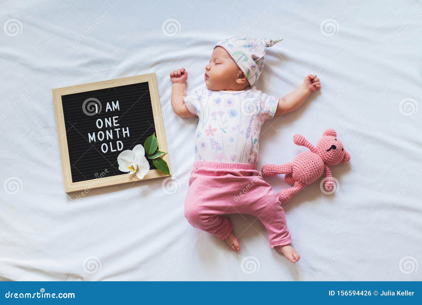 Cute One Month Old Baby Girl in Trendy Outfit Laying between Letter Board  and Teddy Bear. One Month Announcement. Stock Photo - Image of bodysuit,  child: 156594426