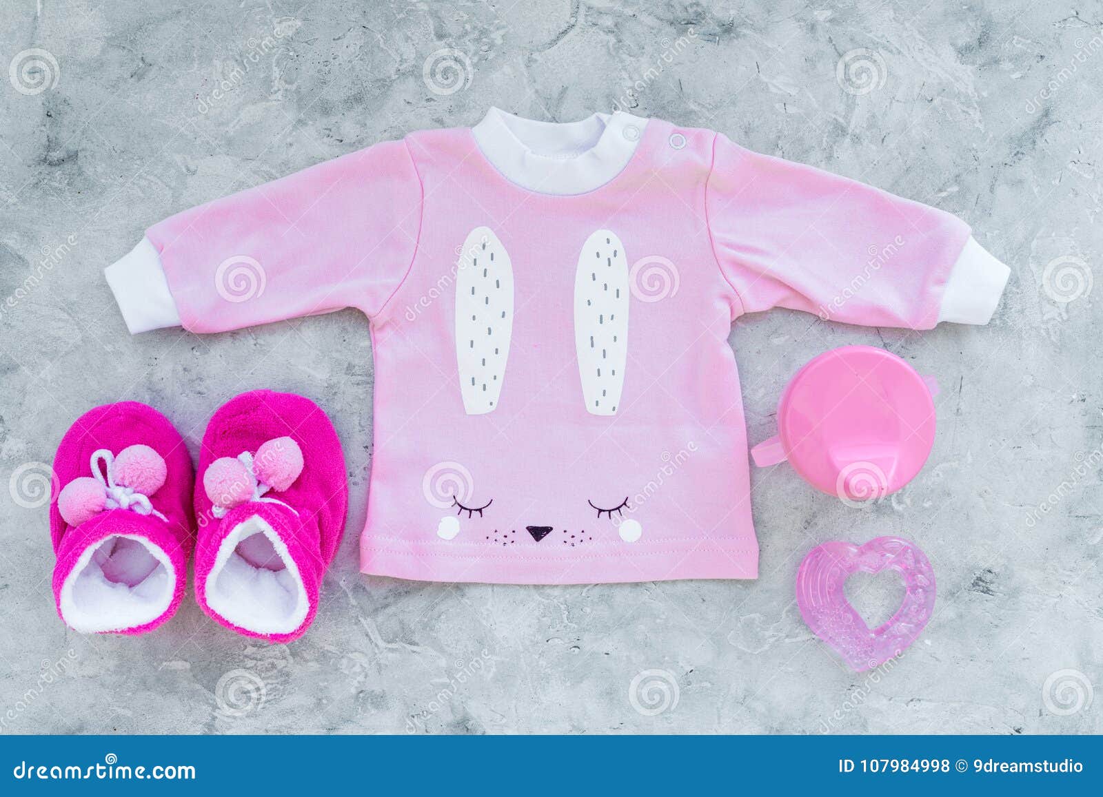 Cute Pink Baby Clothes for Girl. Shirt, Booties, Toy, Bottle on Grey ...