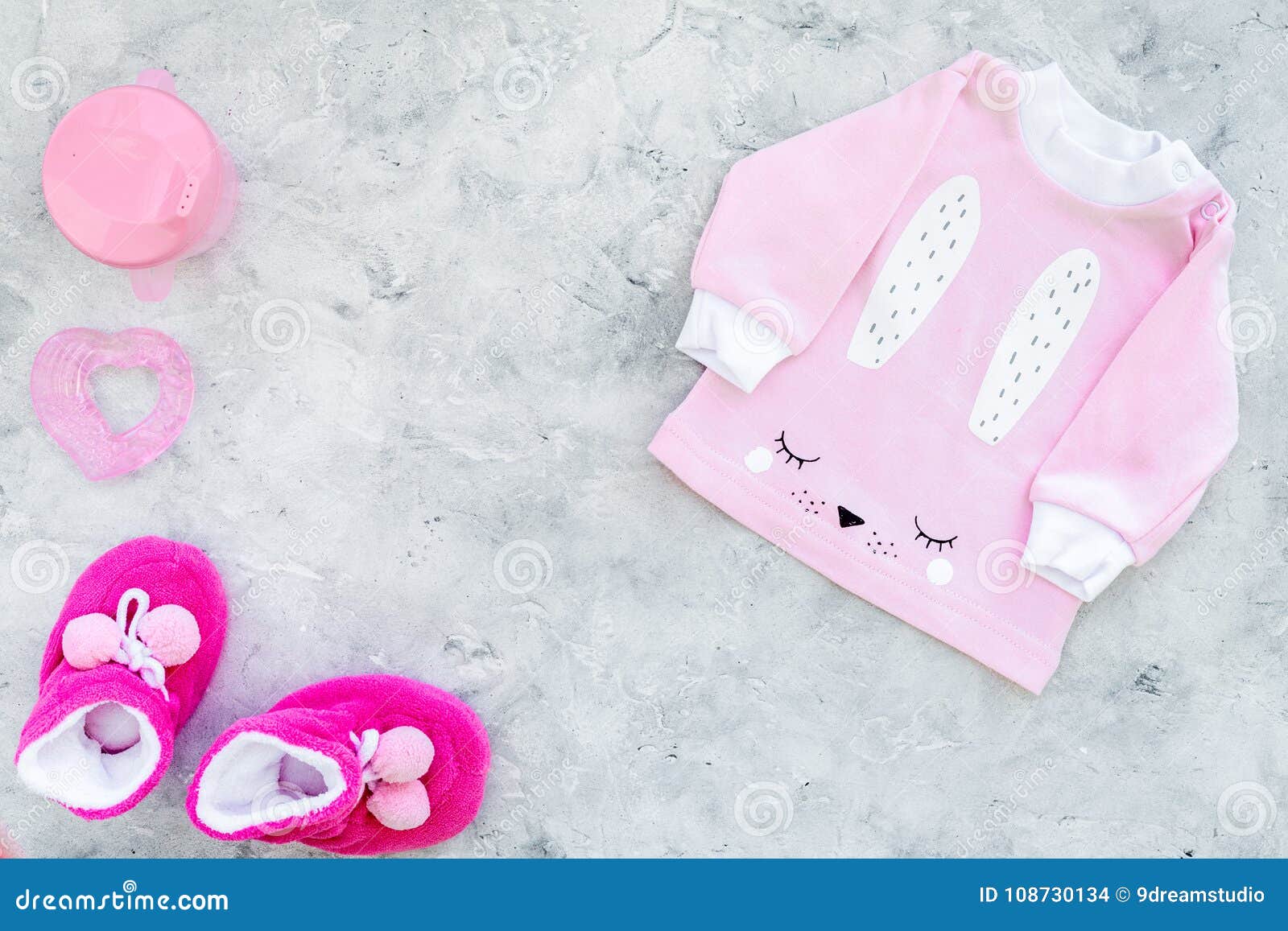 Cute Pink Baby Clothes for Girl. Shirt, Booties, Toy, Bottle on Grey ...